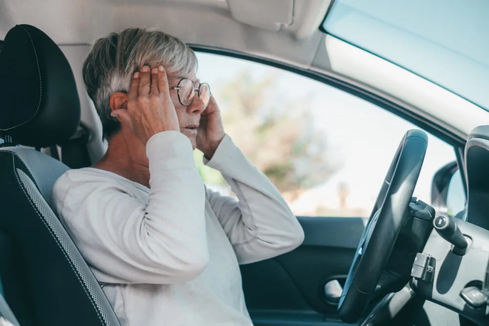 stressed woman inside car